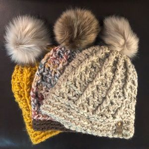 SOLD!!!!Handmade chunky cabled crocheted/knitted hat with faux fur pom pom.